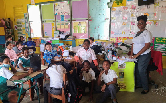 Students at work in a Belizean primary school classroom