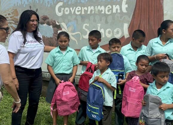 Pupils with new backpacks outside Mabil Ha Government School